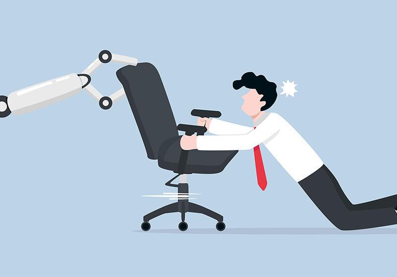 Man holding onto office chair being pulled by metal robot hand