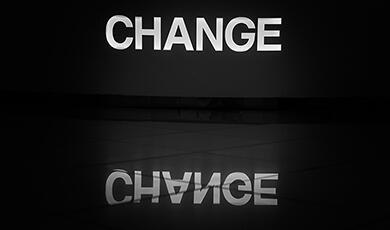 the word CHANGE in white on a black screen