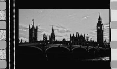 Black and white photo of the Houses of Parliament and Big Ben in London, framed like a film strip