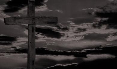 Cross with grey skies