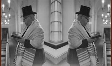 Rabbi holding a book