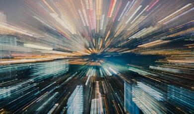 city lights blurred at speed