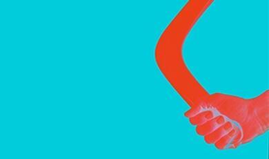 neon abstract image of hand holding boomerang