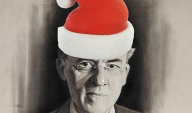 Stafford Cripps with a father christmas hat on