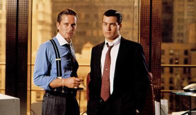 Two men in business suits in office