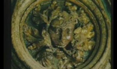 face on a stone wall