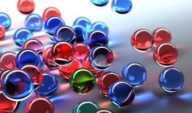an image of clear red, blue and green bubbles
