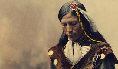 Portrait of Oglala Sioux Council Chief Bone Necklace is a photograph by American School