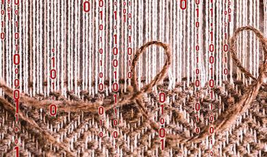 Close up of weaving on loom with computer code floating over the top