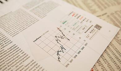 Paper with financial graph