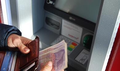 Person using ATM