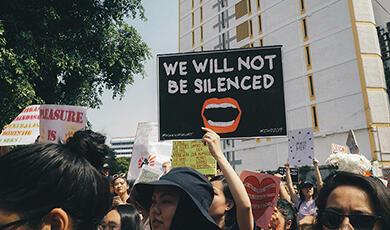 Person holding placard at protest