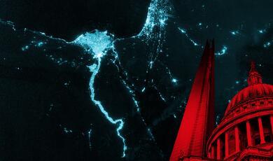 a night time satellite image of a river running into the sea on a coastline